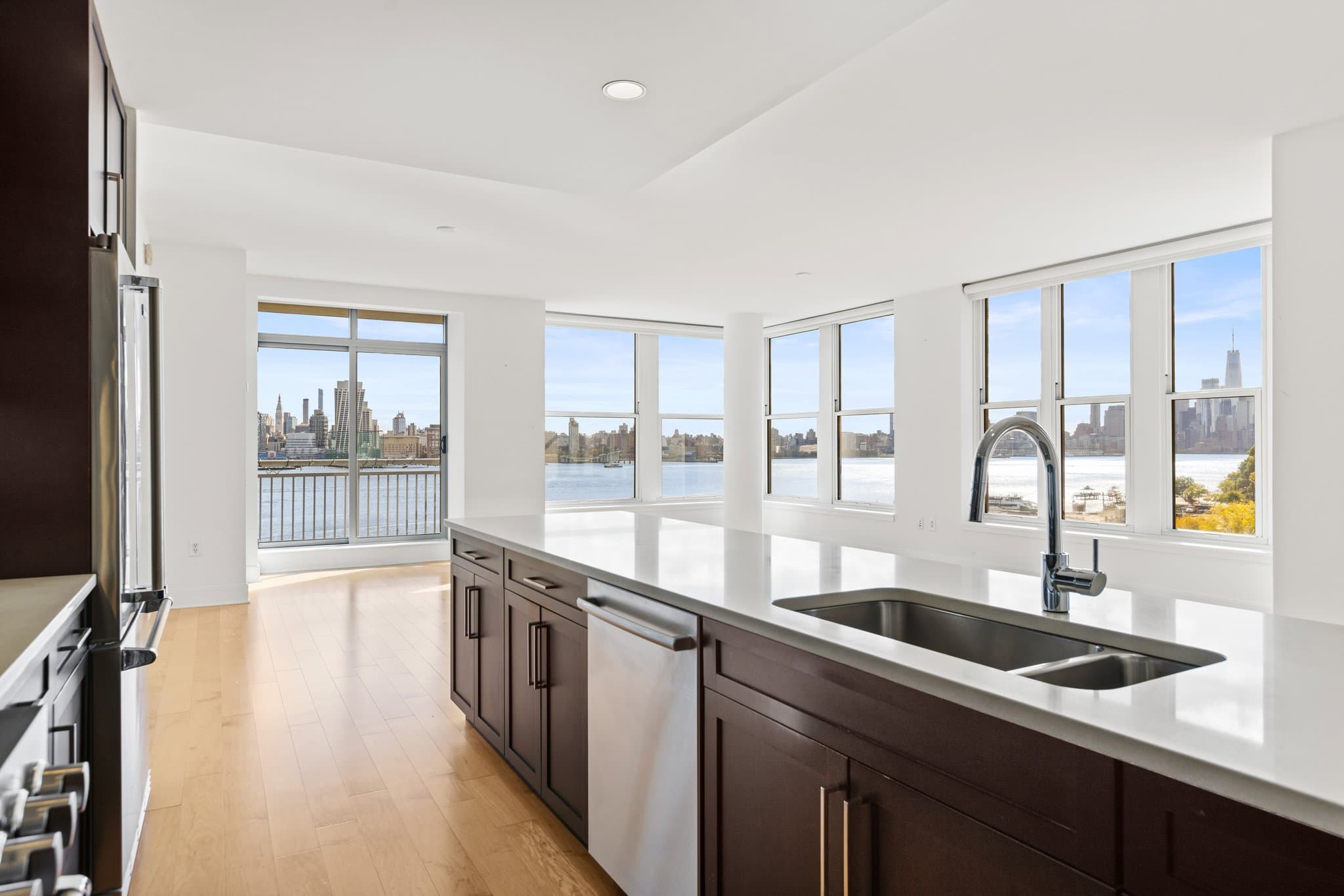 Kitchen island with the skyline through the windows