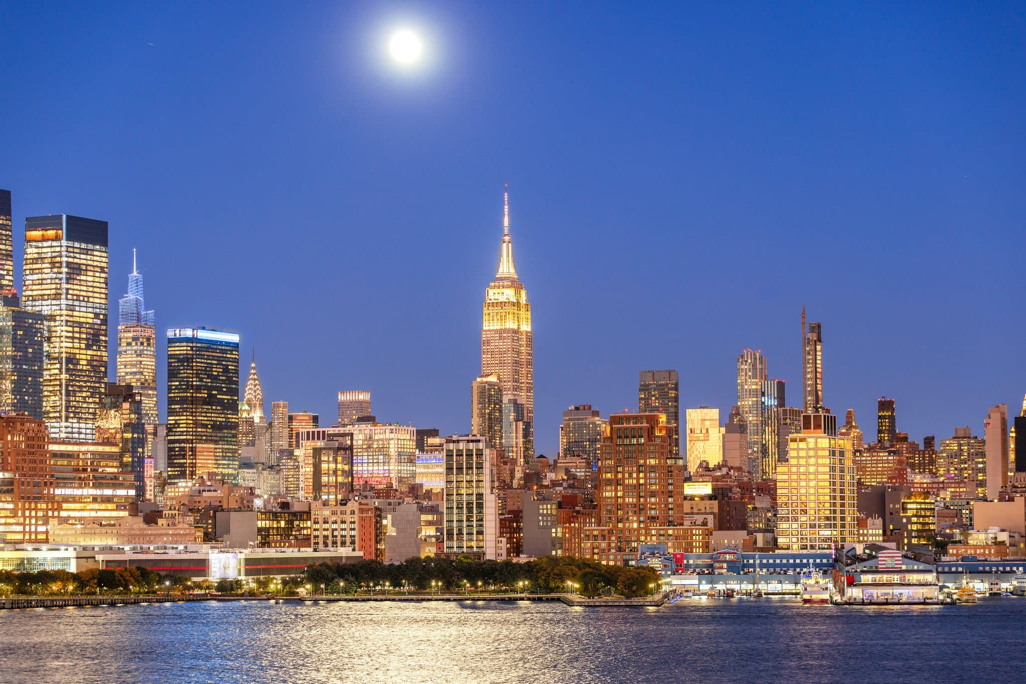The Manhattan skyline at dusk, seen across the Hudson